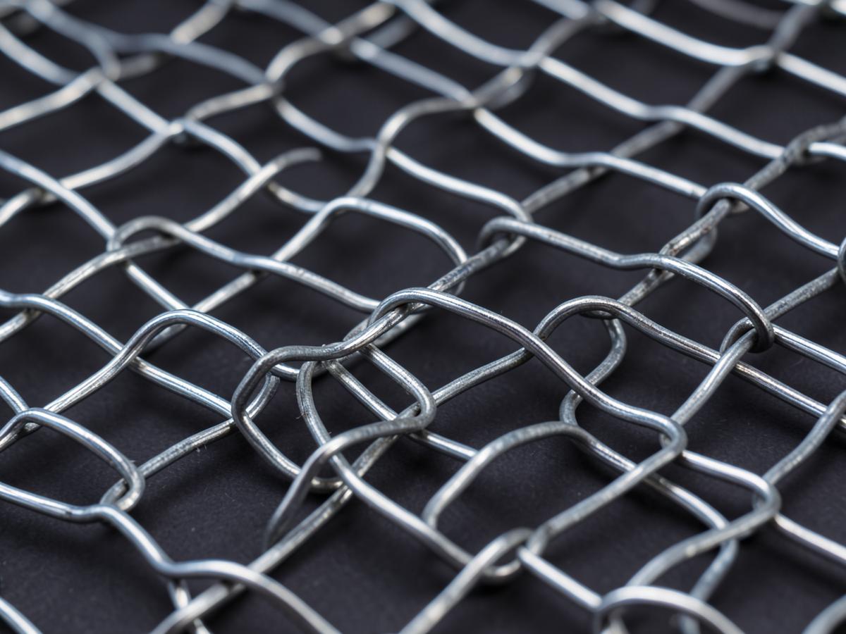 Close-up of high-tensile steel ring net mesh